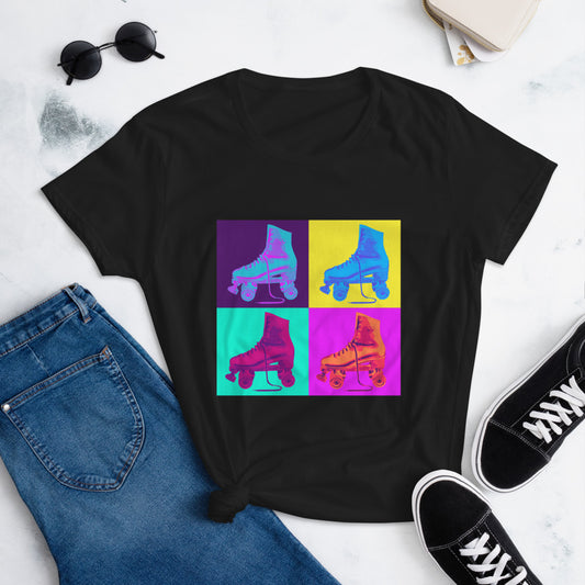 A flat photo of a black roller skate Tshirt, knotted at the side, with a print 4 brightly colored roller skates on bright coloured background squares.  The print is in a silk screen style. 